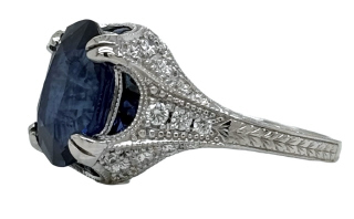 Platinum oval sapphire and diamond ring