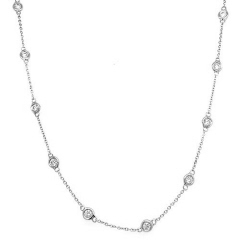 14kt white gold bezel set diamonds by the yard chain. 16"-17".