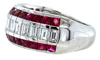 18kt white gold 3-row channel set ruby and diamond band.