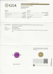 Platinum cushion pink sapphire and diamond halo ring