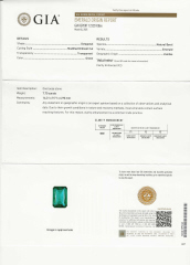 Platinum and 18kt yellow gold Emerald and traps diamond ring