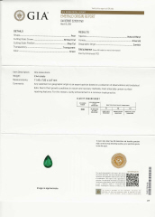 Platinum and 18kt yellow gold pearshape emerald and diamond ring