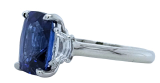 Platinum cushion sapphire and diamond 3 stone ring