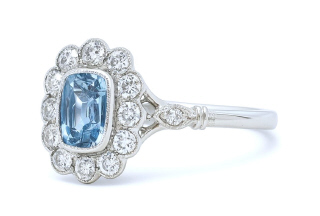 18kt white gold cushion cut aquamarine and diamond ring.