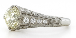 Platinum transition cut round diamond ring
