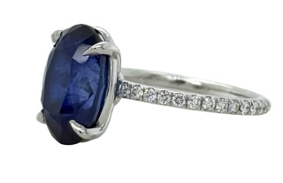 Platinum oval sapphire and diamond ring