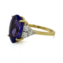 18kt yellow gold and platinum oval tanzanite and diamond ring