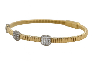 18kt two tone flex bangle bracelet with 3 cushion shape pave diamond stations and magnetic clasp. 6.25"