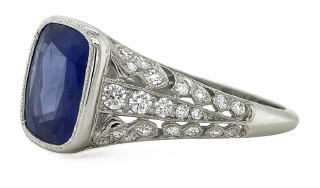 Platinum cushion cut sapphire and diamond ring.