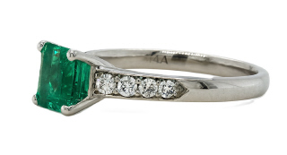 Platinum emerald and diamond ring.