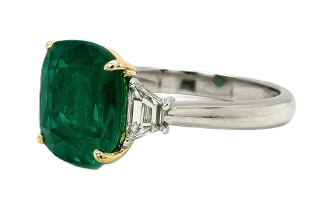Platinum and 18kt yellow gold cushion emerald and traps diamond ring