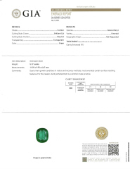 Platinum and 18kt yellow gold cushion emerald and traps diamond ring