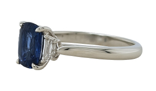 Platinum cushion sapphire and cadi diamond ring