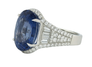18kt white gold round and baguette diamond ring with oval sapphire center