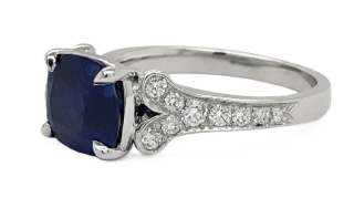 Platinum cushion sapphire and diamond ring