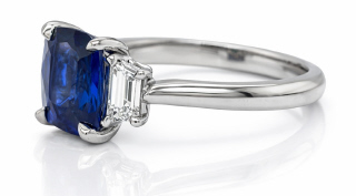 Platinum cushion sapphire and traps diamond ring