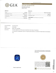 Platinum cushion sapphire and traps diamond ring