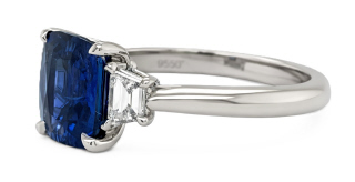 Platinum cushion sapphire and trap diamond ring