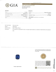 Platinum cushion sapphire and trap diamond ring