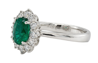 18kt white gold oval emerald and diamond halo ring