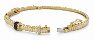 14kt yellow gold fluted style sapphire and diamond bangle bracelet.