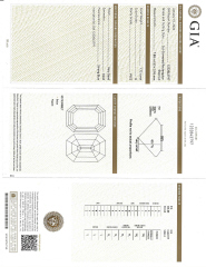Platinum three stone emerald cut diamond ring