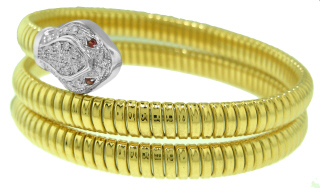 18kt two-tone 2-row serpentino diamond bangle bracelet.