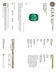 Platinum and 18kt yellow gold cushion emerald and half moon diamond ring