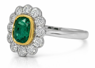 18kt two tone emerald and diamond ring.