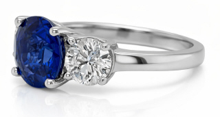 Platinum sapphire and diamond three stone ring