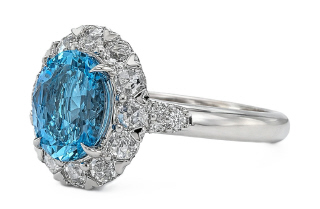 18kt white gold diamond and oval aqua halo ring