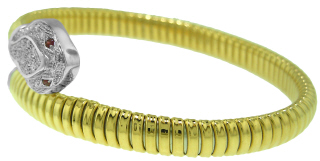 8kt two-tone serpentino diamond bangle bracelet.