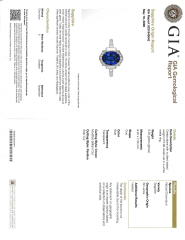 Platinum sapphire, round and baguette diamond ring