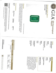 Platinum and 18kt yellow gold EC Emerald and traps diamond ring