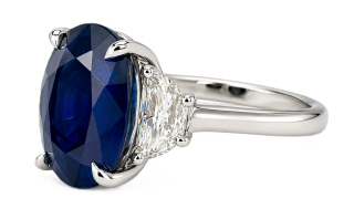 Platinum oval sapphire and half moon diamond ring