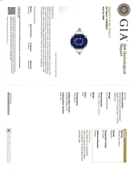 Platinum oval sapphire and half moon diamond ring