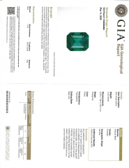 Platinum and 18kt yellow gold  emerald and trap diamond 3 stone ring
