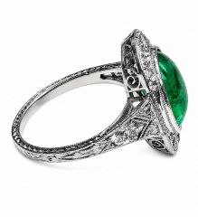 Platinum Edwardian/Deco antique emerald and diamond ring.