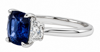 Platinum cushion sapphire and half moon diamond ring