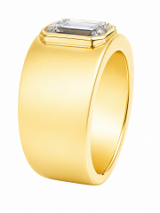 Lab Diamond: 14kt yellow gold bezel set Lab Grown Emerald Cut Diamond ring.