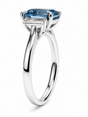 Platinum aqua and diamond 3-stone ring.