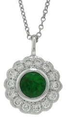 18kt white gold emerald and diamond pendant with chain.