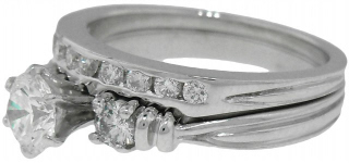 14kt white gold diamond solitaire .56ct with matching diamond band