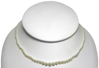 Graduated natural pearl and 14kt yellow gold chain choker