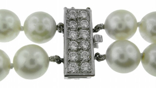Double strand 17" pearl necklace with 18kt white gold diamond/amethyst center