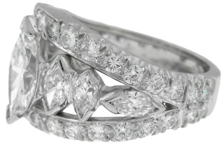 Platinum graduated marquise and round diamond band