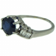 Platinum sapphire and baguette diamond ring