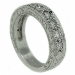 Plat engraved diamond band