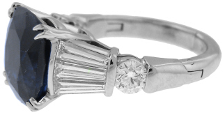 Platinum cushion shape sapphire and diamond ring