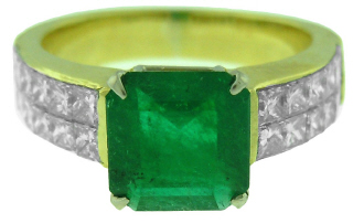 Platinum and 18kt yellow gold emerald and princess cut diamond ring